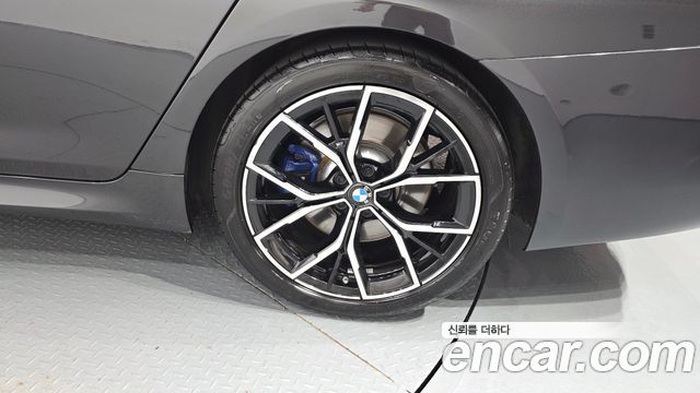BMW 5-Series 2023 — photo 7