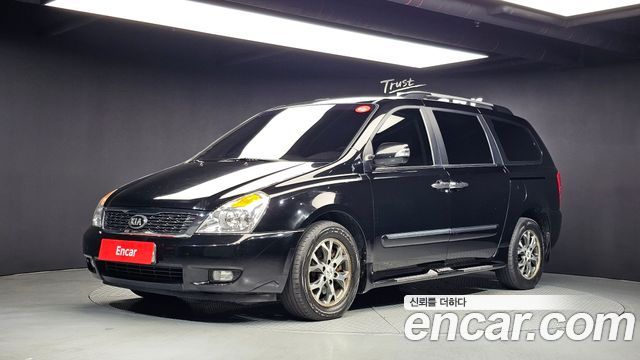 Kia Canival 2013 — photo 1