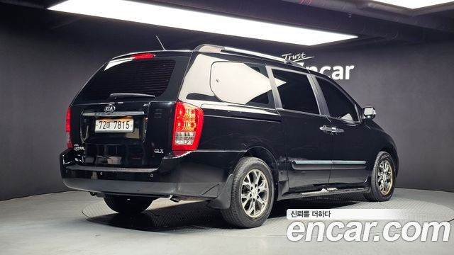 Kia Canival 2013 — photo 2