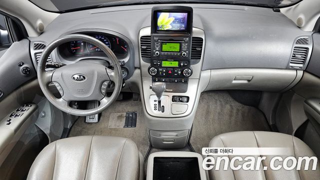 Kia Canival 2013 — photo 7
