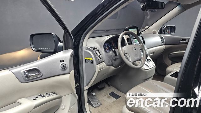 Kia Canival 2013 — photo 10