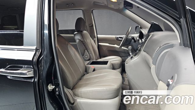 Kia Canival 2013 — photo 11