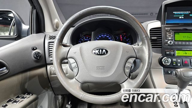 Kia Canival 2013 — photo 13