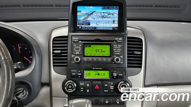 Kia Canival 2013 — photo 14