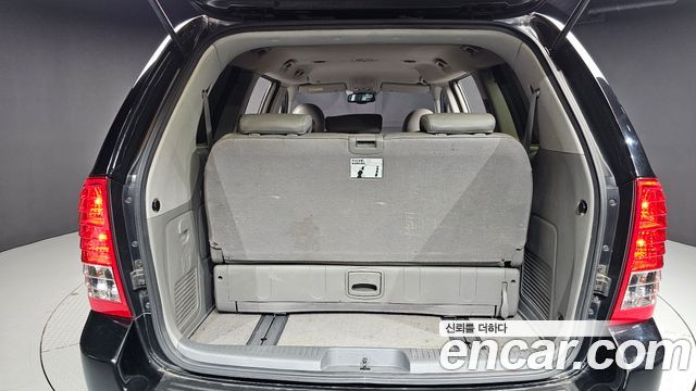 Kia Canival 2013 — photo 20