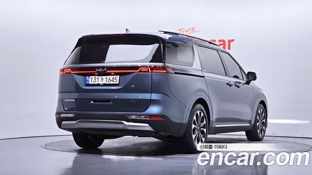 Kia Canival 2023 — photo 2