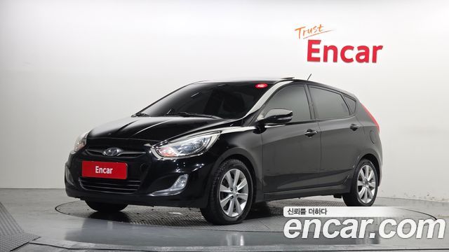Hyundai Accent 2012 — photo 1
