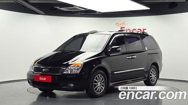 Kia Canival 2013 — photo 1