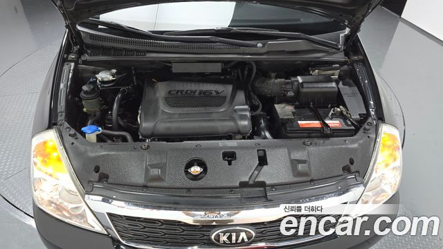 Kia Canival 2013 — photo 6