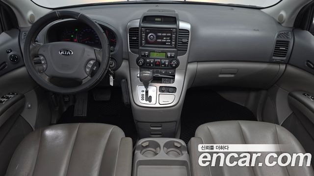 Kia Canival 2013 — photo 10