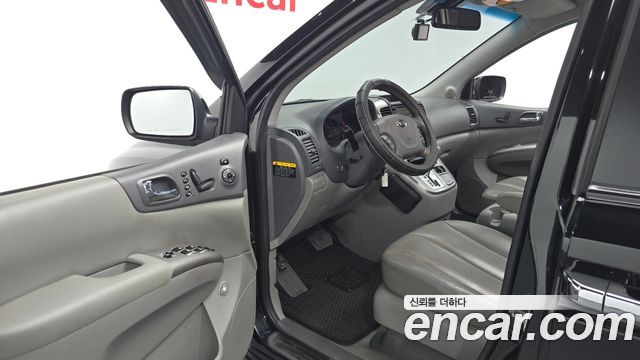 Kia Canival 2013 — photo 13