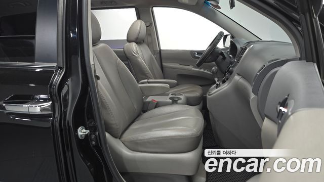 Kia Canival 2013 — photo 17