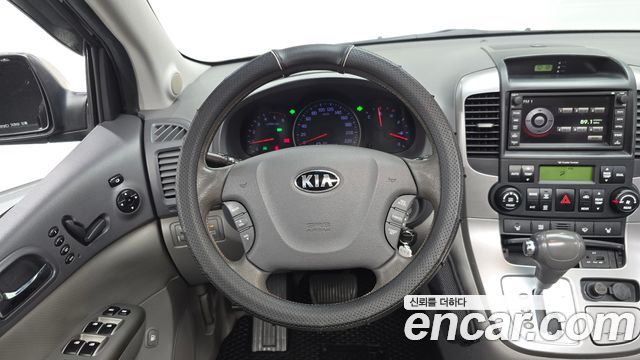 Kia Canival 2013 — photo 18
