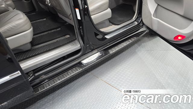 Kia Canival 2013 — photo 31
