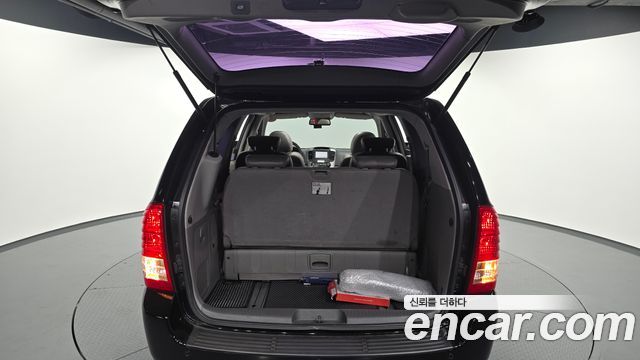 Kia Canival 2013 — photo 32