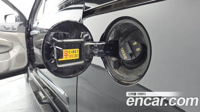 Kia Canival 2013 — photo 34