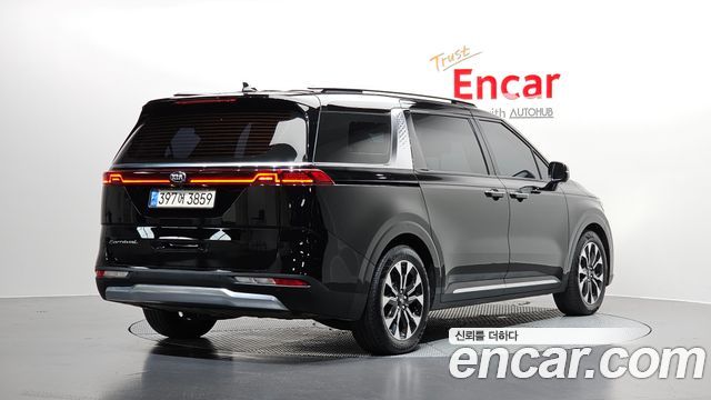 Kia Canival 2021 — photo 2