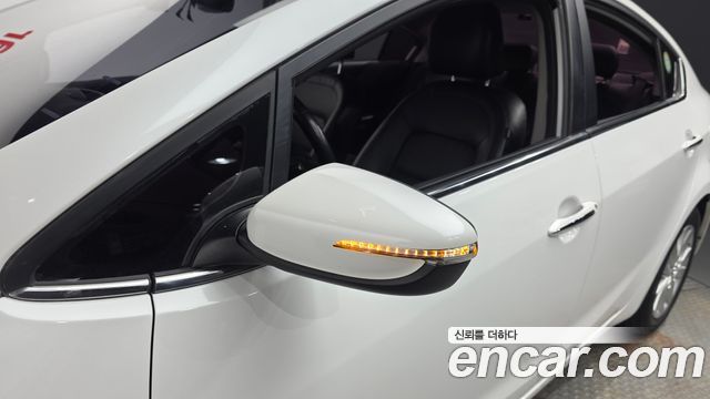 Kia K3 2015 — photo 19
