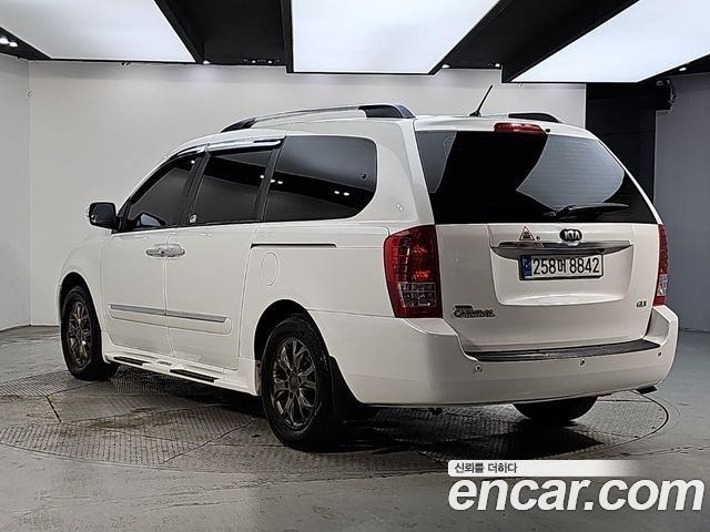 Kia Canival 2013 — photo 3