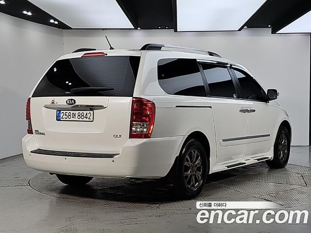 Kia Canival 2013 — photo 4