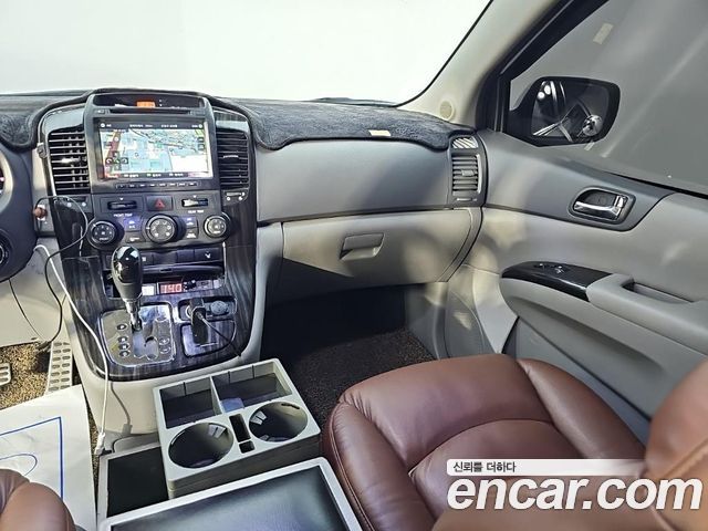Kia Canival 2013 — photo 10