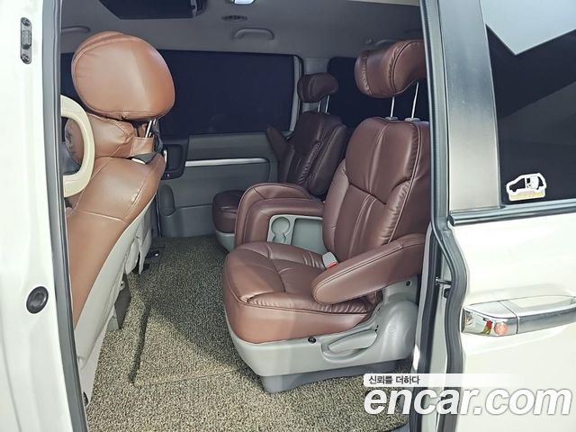 Kia Canival 2013 — photo 12