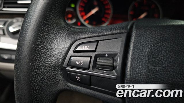 BMW 5-Series 2013 — photo 27