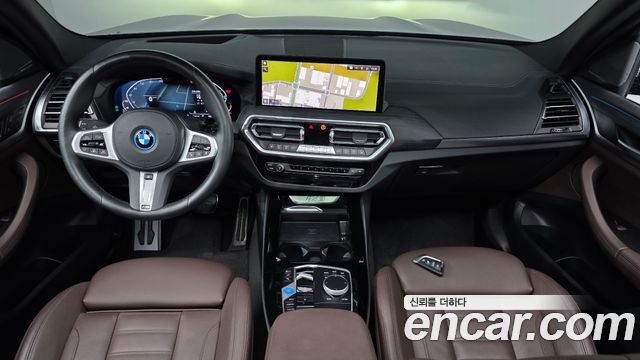 BMW iX3 2024 — photo 10