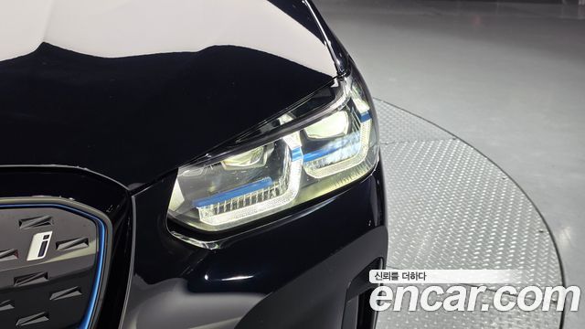 BMW iX3 2024 — photo 8