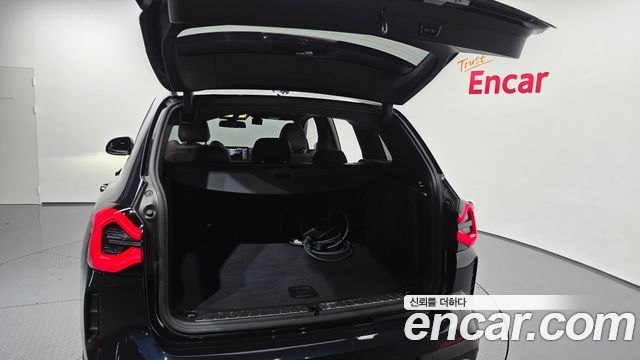 BMW iX3 2024 — photo 33