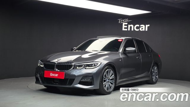 BMW 3-Series 2022 — photo 1