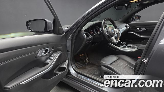 BMW 3-Series 2022 — photo 10