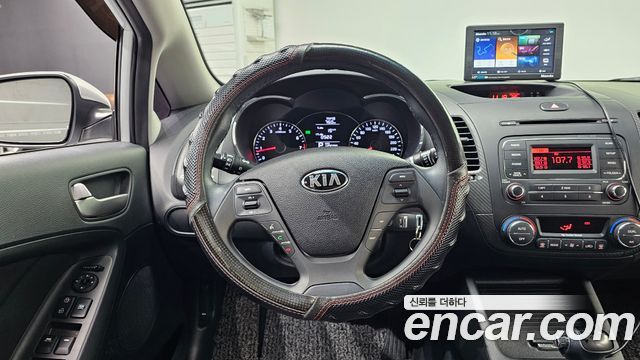 Kia K3 2015 — photo 13