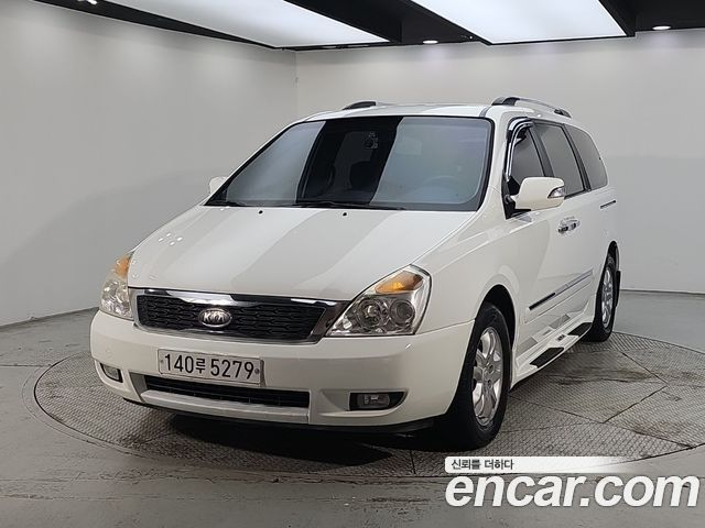 Kia Canival 2011 — photo 1