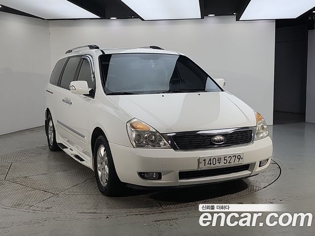 Kia Canival 2011 — photo 2