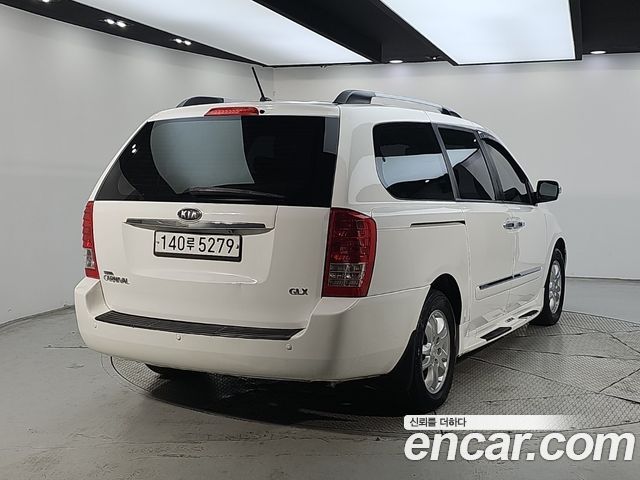 Kia Canival 2011 — photo 4