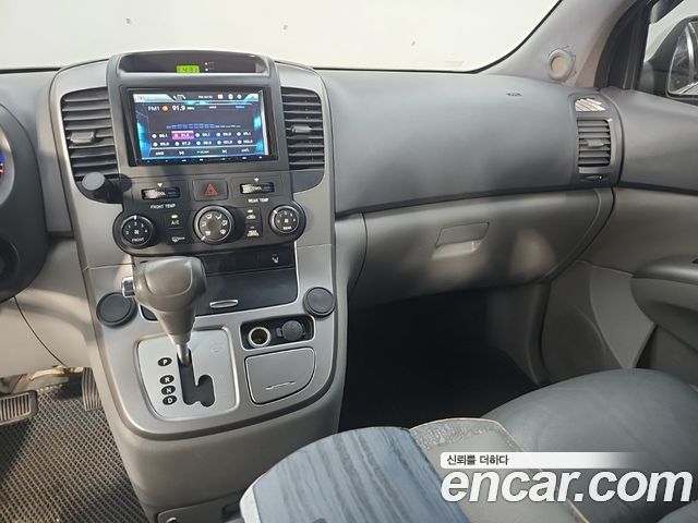 Kia Canival 2011 — photo 10