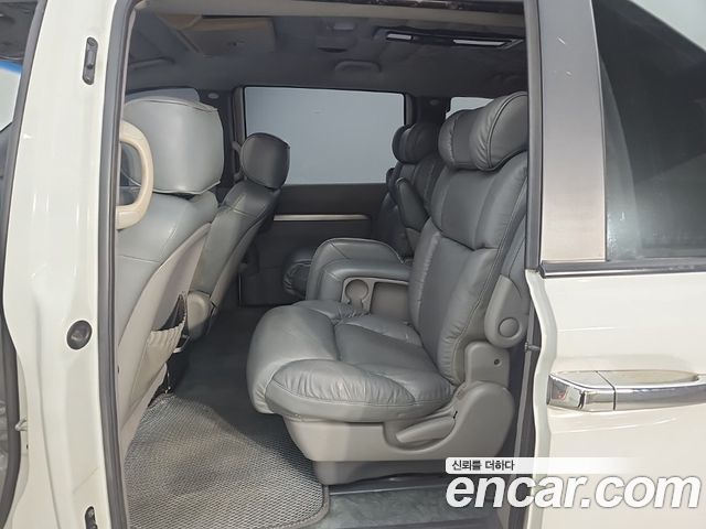 Kia Canival 2011 — photo 12