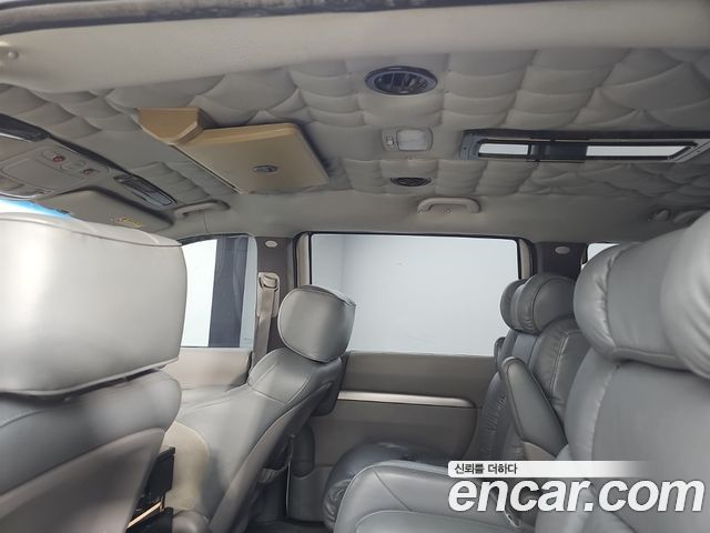 Kia Canival 2011 — photo 13
