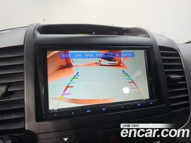 Kia Canival 2011 — photo 15