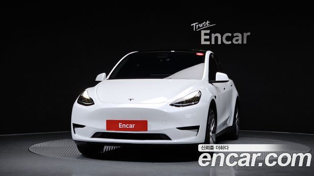 Tesla Model Y 2023 — photo 3