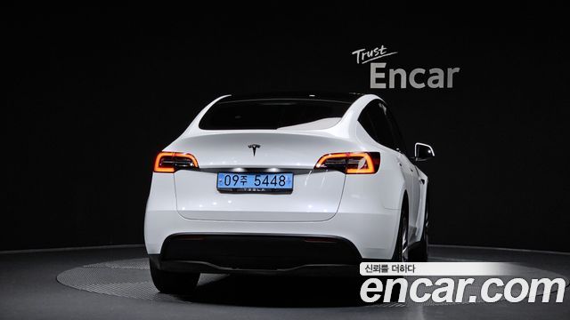 Tesla Model Y 2023 — photo 4