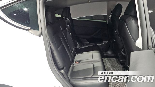 Tesla Model Y 2023 — photo 17