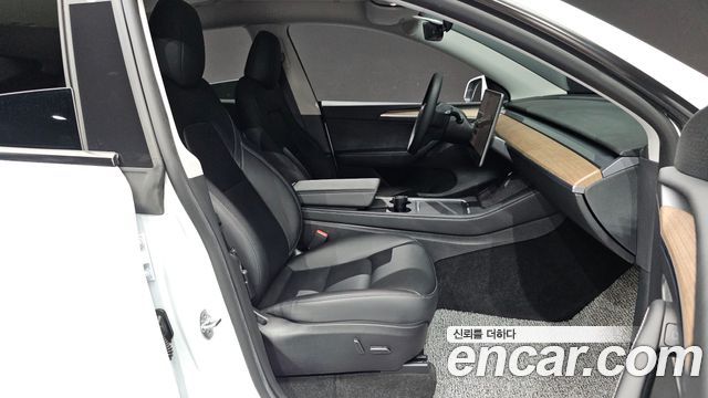 Tesla Model Y 2023 — photo 18