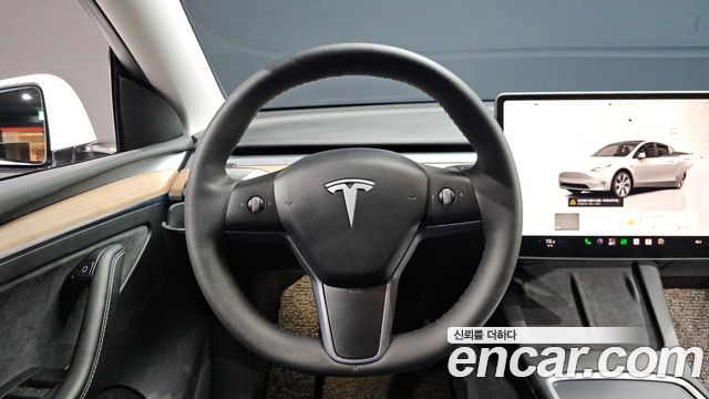 Tesla Model Y 2023 — photo 19