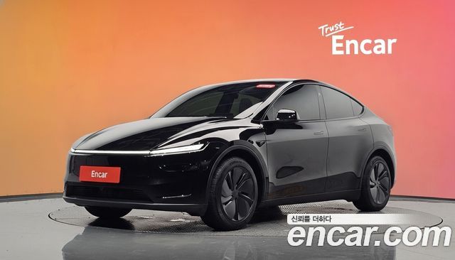 Tesla Model Y 2025 — photo 1