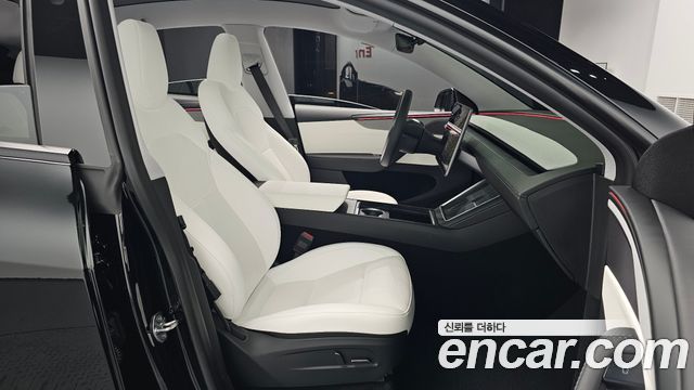 Tesla Model Y 2025 — photo 16