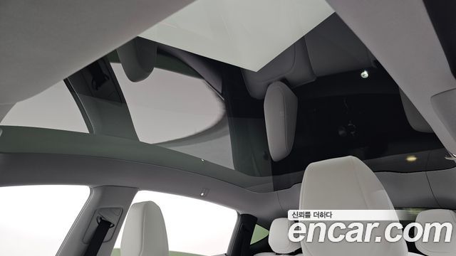 Tesla Model Y 2025 — photo 36