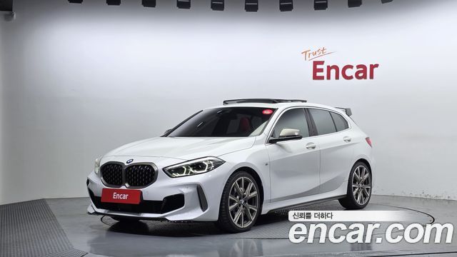 BMW 1-Series 2022 — photo 1