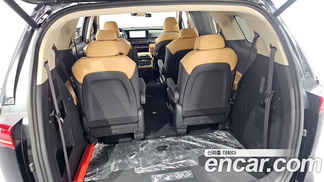 Kia Canival 2023 — photo 38